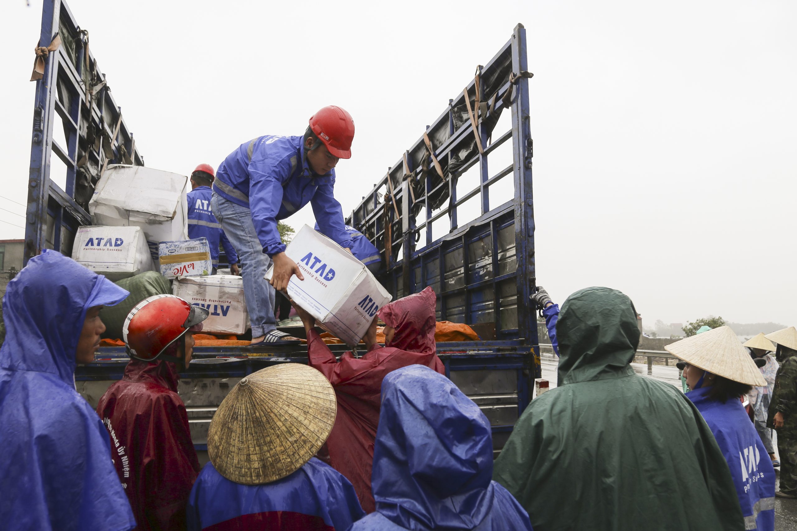 ATAD members sharing difficulties with people affected by flooding in Quang Binh province